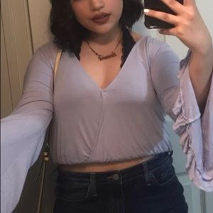 Pastel purple top , fits like (m)